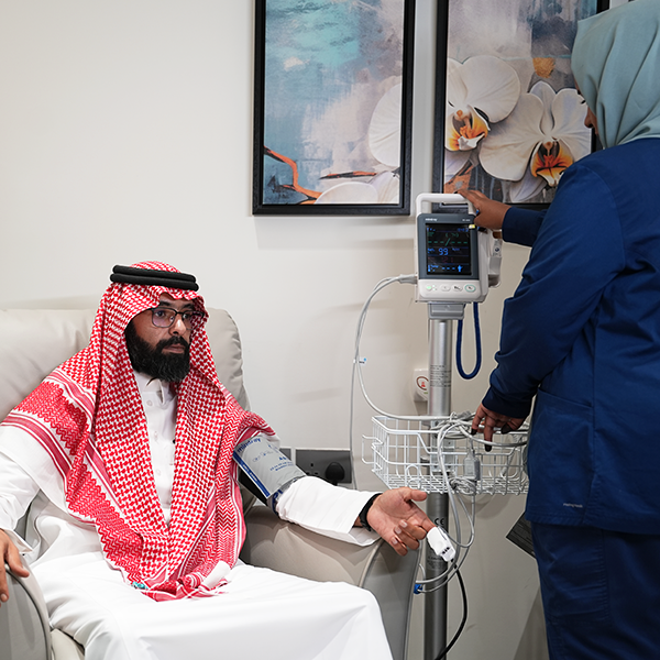 Patient receiving their first IV infusion in a clinic setting